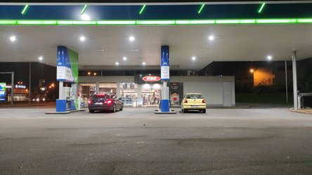 OMV fuel station signage at night in Brno
