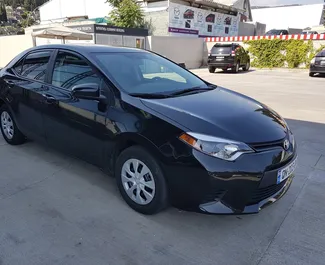 Front view of a rental Toyota Corolla in Tbilisi, Georgia ✓ Car #230. ✓ Automatic TM ✓ 0 reviews.
