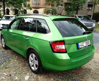 Skoda Fabia Combi 2015 car hire in Czechia, featuring ✓ Petrol fuel and 105 horsepower ➤ Starting from 22 EUR per day.