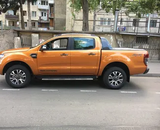 Арендуйте Ford Ranger 2018 в Грузии. Топливо: Дизель. Мощность: 480 л.с. ➤ Стоимость от 210 GEL в сутки.