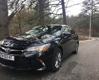 Front view of a rental Toyota Camry in Tbilisi, Georgia ✓ Car #258. ✓ Automatic TM ✓ 0 reviews.