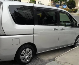 Nissan Serena 2015 car hire in Cyprus, featuring ✓ Petrol fuel and 126 horsepower ➤ Starting from 44 EUR per day.