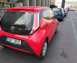 Toyota Aygo 2021 car hire in Czechia, featuring ✓ Petrol fuel and 69 horsepower ➤ Starting from 25 EUR per day.
