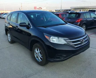 Front view of a rental Honda CR-V in Tbilisi, Georgia ✓ Car #663. ✓ Automatic TM ✓ 0 reviews.