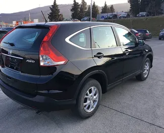 Honda CR-V 2015 car hire in Georgia, featuring ✓ Petrol fuel and 160 horsepower ➤ Starting from 138 GEL per day.
