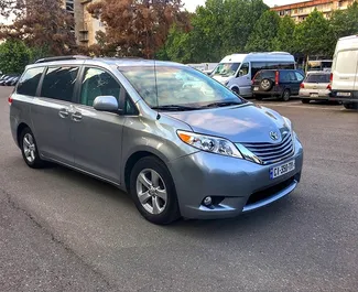 Front view of a rental Toyota Sienna in Tbilisi, Georgia ✓ Car #668. ✓ Automatic TM ✓ 7 reviews.