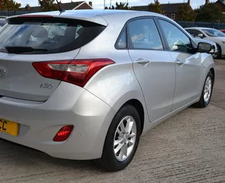 Hyundai i30 2014 car hire in Cyprus, featuring ✓ Diesel fuel and 114 horsepower ➤ Starting from 20 EUR per day.