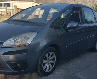 Front view of a rental Citroen C4 Picasso in Bar, Montenegro ✓ Car #544. ✓ Automatic TM ✓ 3 reviews.