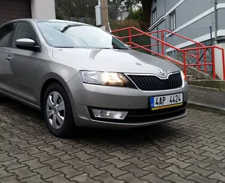 Front view of a rental Skoda Rapid in Prague, Czechia ✓ Car #897. ✓ Automatic TM ✓ 0 reviews.
