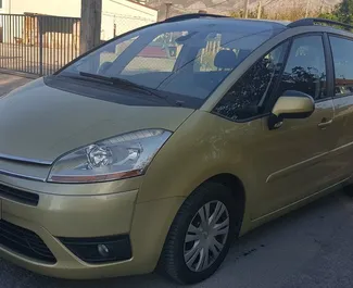 Front view of a rental Citroen C4 Grand Picasso in Bar, Montenegro ✓ Car #543. ✓ Automatic TM ✓ 20 reviews.