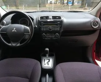 Interior of Mitsubishi Space Star for hire in Bulgaria. A Great 5-seater car with a Automatic transmission.