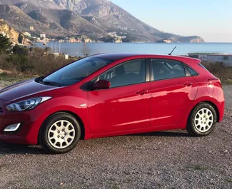 Front view of a rental Hyundai i30 in Rafailovici, Montenegro ✓ Car #499. ✓ Automatic TM ✓ 0 reviews.
