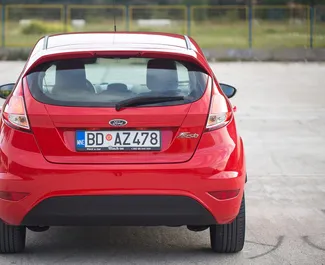 Ford Fiesta 2016 car hire in Montenegro, featuring ✓ Petrol fuel and 105 horsepower ➤ Starting from 17 EUR per day.