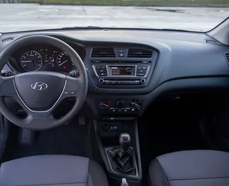 Interior of Hyundai i20 for hire in Montenegro. A Great 5-seater car with a Manual transmission.