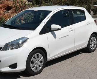 Front view of a rental Toyota Yaris in Crete, Greece ✓ Car #1099. ✓ Manual TM ✓ 0 reviews.
