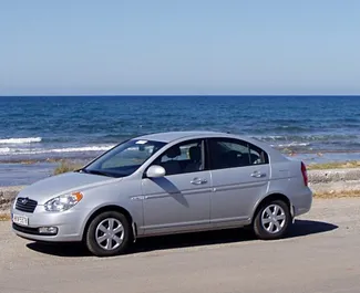 Front view of a rental Hyundai Verna in Crete, Greece ✓ Car #1123. ✓ Manual TM ✓ 0 reviews.