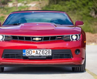 Chevrolet Camaro Cabrio 2015 car hire in Montenegro, featuring ✓ Petrol fuel and 328 horsepower ➤ Starting from 90 EUR per day.