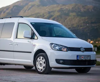 Front view of a rental Volkswagen Caddy Maxi in Budva, Montenegro ✓ Car #1111. ✓ Automatic TM ✓ 3 reviews.