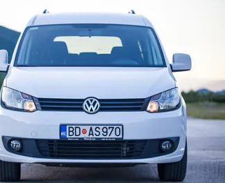 Volkswagen Caddy Maxi 2013 car hire in Montenegro, featuring ✓ Diesel fuel and 102 horsepower ➤ Starting from 34 EUR per day.