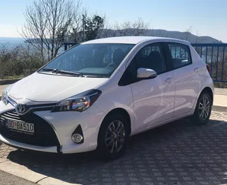 Front view of a rental Toyota Yaris in Rafailovici, Montenegro ✓ Car #495. ✓ Automatic TM ✓ 8 reviews.