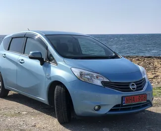 Front view of a rental Nissan Note in Paphos, Cyprus ✓ Car #1215. ✓ Automatic TM ✓ 0 reviews.
