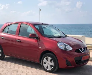Front view of a rental Nissan Micra in Paphos, Cyprus ✓ Car #1218. ✓ Automatic TM ✓ 2 reviews.