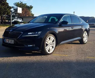 Front view of a rental Skoda Superb in Budva, Montenegro ✓ Car #1220. ✓ Automatic TM ✓ 2 reviews.