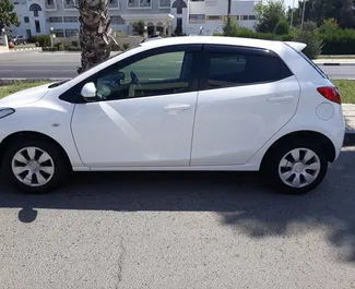 Front view of a rental Mazda Demio in Larnaca, Cyprus ✓ Car #830. ✓ Automatic TM ✓ 0 reviews.