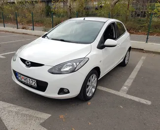 Front view of a rental Mazda 2 in Podgorica, Montenegro ✓ Car #1324. ✓ Manual TM ✓ 0 reviews.
