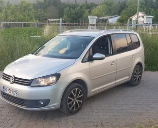 Front view of a rental Volkswagen Touran in Bar, Montenegro ✓ Car #549. ✓ Automatic TM ✓ 16 reviews.
