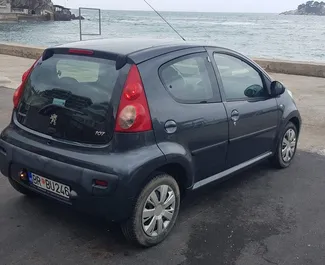 Peugeot 107 2013 car hire in Montenegro, featuring ✓ Petrol fuel and 70 horsepower ➤ Starting from 14 EUR per day.