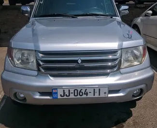 Front view of a rental Mitsubishi Pajero Io in Tbilisi, Georgia ✓ Car #1410. ✓ Automatic TM ✓ 5 reviews.