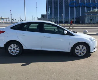 Ford Focus 2015 car hire in Crimea, featuring ✓ Petrol fuel and 105 horsepower ➤ Starting from 2350 RUB per day.