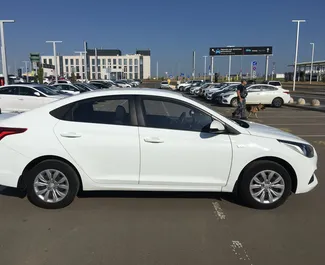 Hyundai Solaris 2018 car hire in Crimea, featuring ✓ Petrol fuel and 123 horsepower ➤ Starting from 2550 RUB per day.