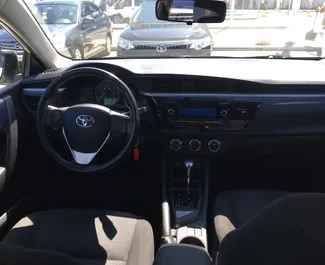 Toyota Corolla 2015 available for rent at Simferopol Airport, with unlimited mileage limit.