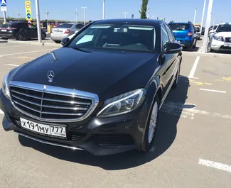 Front view of a rental Mercedes-Benz C180 at Simferopol Airport, Crimea ✓ Car #1398. ✓ Automatic TM ✓ 0 reviews.