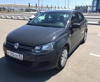Front view of a rental Volkswagen Polo Sedan at Simferopol Airport, Crimea ✓ Car #1403. ✓ Automatic TM ✓ 0 reviews.