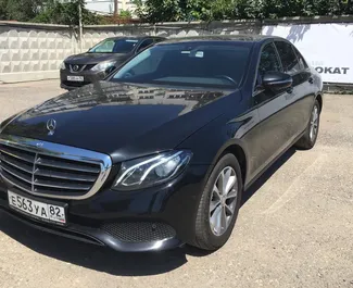 Front view of a rental Mercedes-Benz E200 at Simferopol Airport, Crimea ✓ Car #1399. ✓ Automatic TM ✓ 0 reviews.