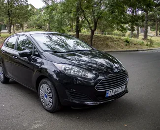 Front view of a rental Ford Fiesta in Tbilisi, Georgia ✓ Car #1374. ✓ Manual TM ✓ 0 reviews.