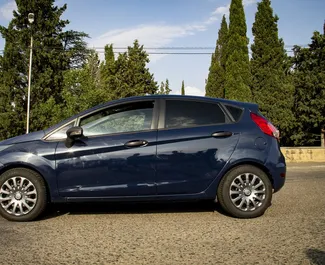 Ford Fiesta 2014 available for rent in Tbilisi, with unlimited mileage limit.