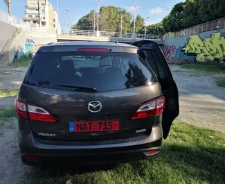 Mazda Premacy rental. Comfort, Minivan Car for Renting in Cyprus ✓ Deposit of 300 EUR ✓ TPL, CDW, SCDW insurance options.