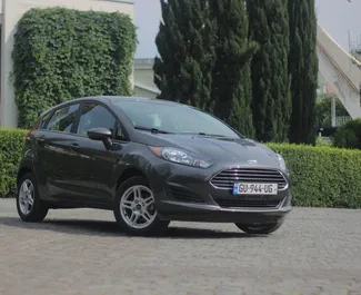 Front view of a rental Ford Fiesta in Tbilisi, Georgia ✓ Car #1230. ✓ Automatic TM ✓ 0 reviews.