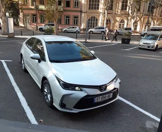 Front view of a rental Toyota Corolla in Tbilisi, Georgia ✓ Car #1686. ✓ Automatic TM ✓ 0 reviews.
