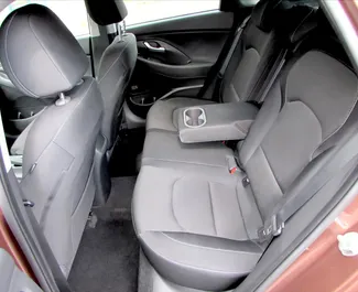 Interior of Hyundai i30 for hire in Czechia. A Great 5-seater car with a Automatic transmission.