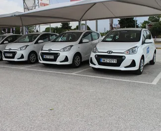 Hyundai i10 2019 car hire in Greece, featuring ✓ Petrol fuel and 70 horsepower ➤ Starting from 18 EUR per day.