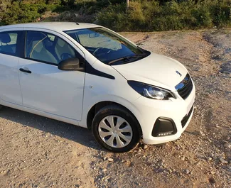 Front view of a rental Peugeot 108 in Crete, Greece ✓ Car #1780. ✓ Manual TM ✓ 1 reviews.