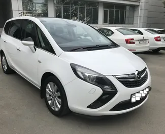 Opel Zafira Tourer 2014 car hire in Crimea, featuring ✓ Petrol fuel and 150 horsepower ➤ Starting from 3190 RUB per day.