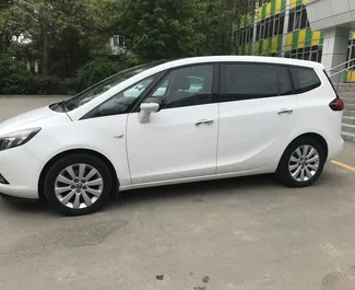 Opel Zafira Tourer 2014 available for rent at Simferopol Airport, with 250 km/day mileage limit.