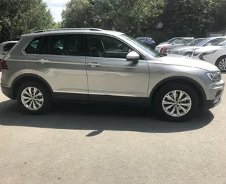 Volkswagen Tiguan rental. Comfort, Crossover Car for Renting in Crimea ✓ Deposit of 30000 RUB ✓ TPL, CDW insurance options.