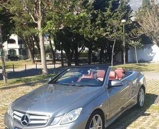 Front view of a rental Mercedes-Benz E-Class Cabrio in Rafailovici, Montenegro ✓ Car #507. ✓ Automatic TM ✓ 4 reviews.